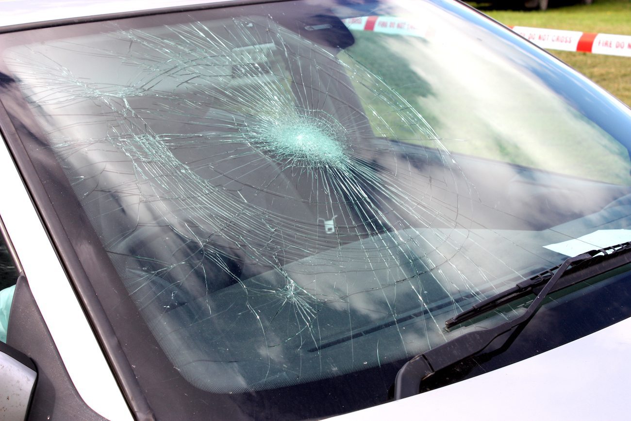 Windshield Damage from Truck Debris: What to Do